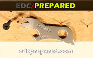 Gerber Shard EDC tool on a board with screws and nails